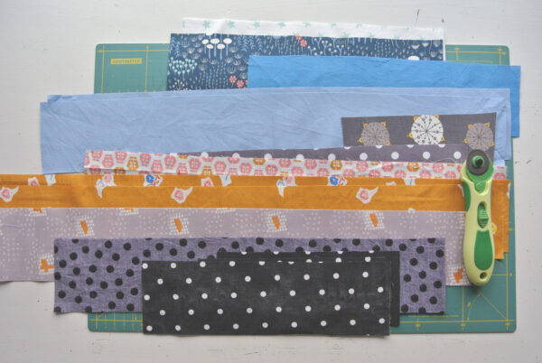 stukken stof voor de bies op maat knippen